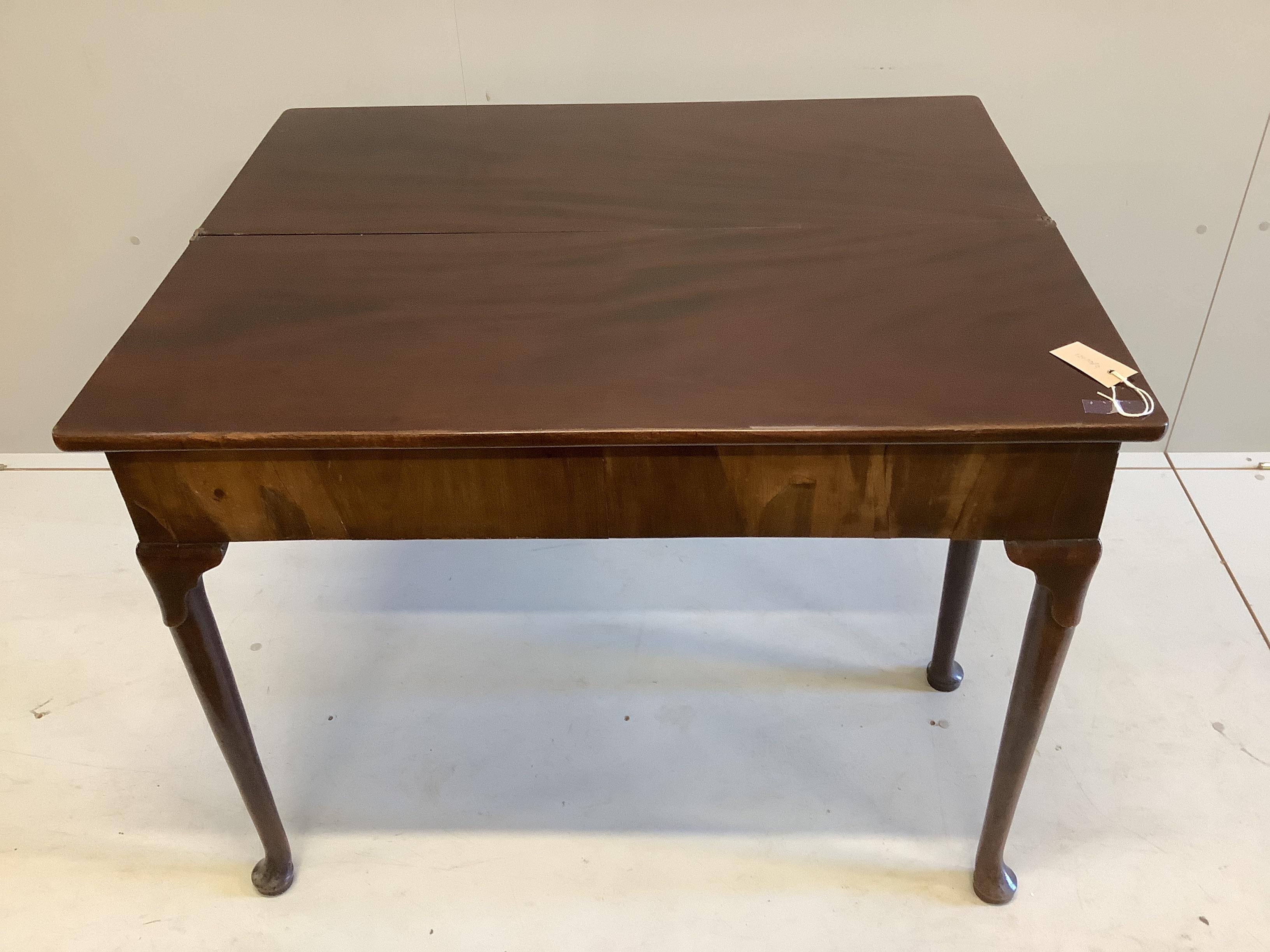 A George III rectangular mahogany folding tea table, width 97cm, depth 39cm, height 75cm